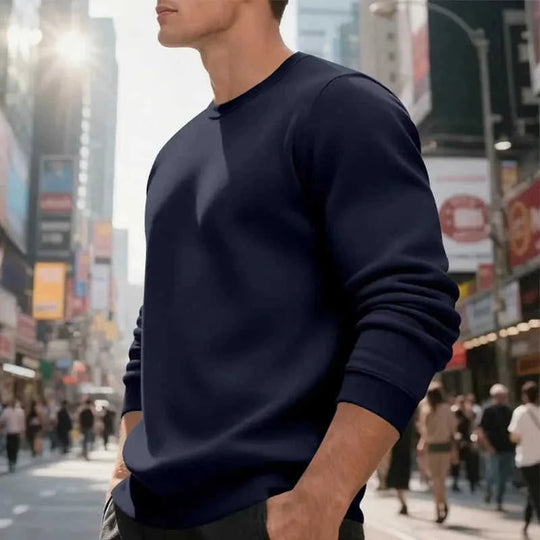 fleece-lined construction | loose fit sweater | cotton blend material | energy saving