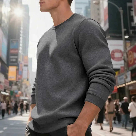 fleece-lined construction | loose fit sweater | cotton blend material | energy saving