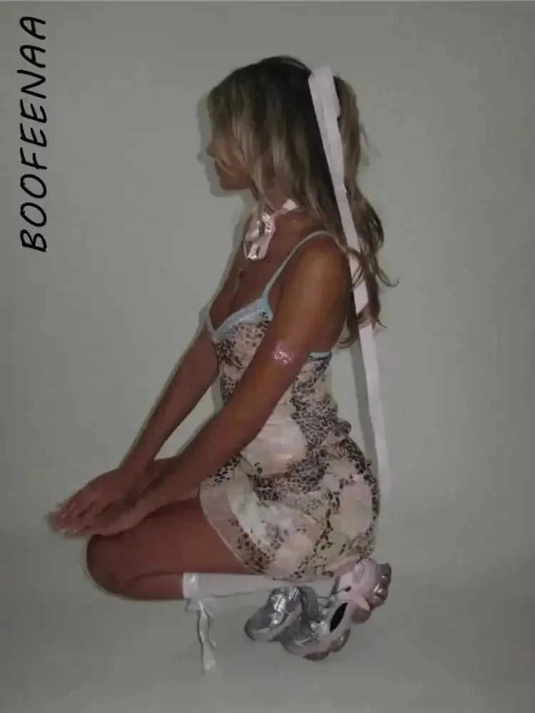 leopard print mesh fabric | v-neck mini dress | stretchy bodycon fit | ultrasonic cleaning