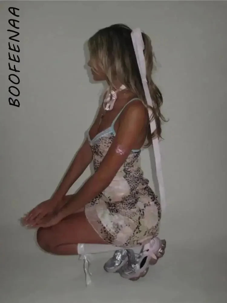 leopard print mesh fabric | v-neck mini dress | stretchy bodycon fit | ultrasonic cleaning