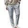 quick-dry fabric pants | elastic waistband trousers | multiple utility pockets | ultrasonic cleaning