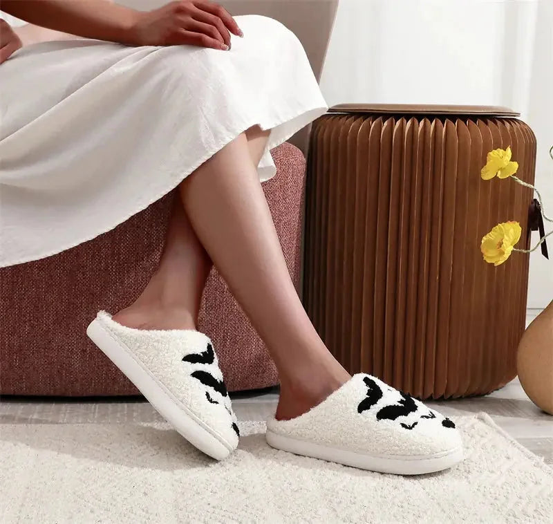 plush bat slippers | horror-themed house shoes | cozy halloween slippers | energy saving