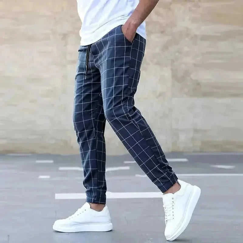 stretchable cotton blend fabric | adjustable drawstring waistband | relaxed fit trousers | ultrasonic cleaning