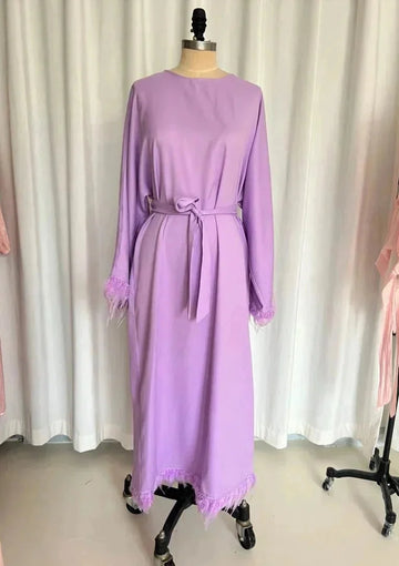 feather detail maxi dress | long sleeve round neck dress | lace-up back dress | ultrasonic cleaning