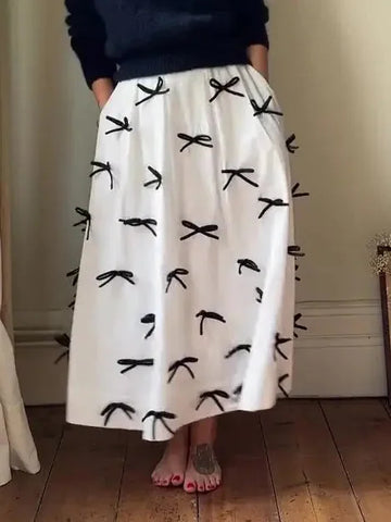 high-waist bow skirt | a-line midi skirt | elastic waistband skirt | ultrasonic cleaning