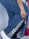 leopard print jeans | high-waisted zip-up jeans | stretch denim fabric | energy saving