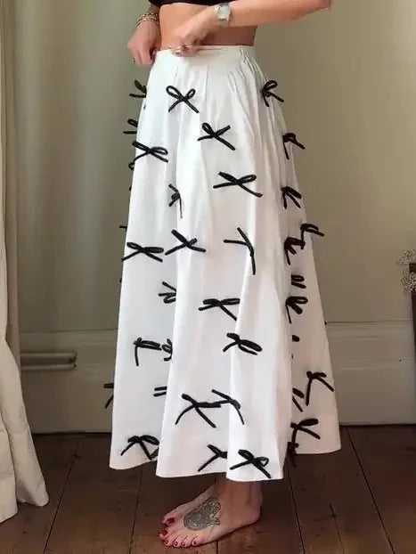 high-waist bow skirt | a-line midi skirt | elastic waistband skirt | ultrasonic cleaning