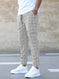 stretchable cotton blend fabric | adjustable drawstring waistband | relaxed fit trousers | energy saving