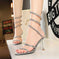 snake-shaped stiletto heels | rhinestone embellished heels | evening party shoes | energy saving