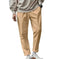 quick-dry fabric pants | elastic waistband trousers | multiple utility pockets | ultrasonic cleaning