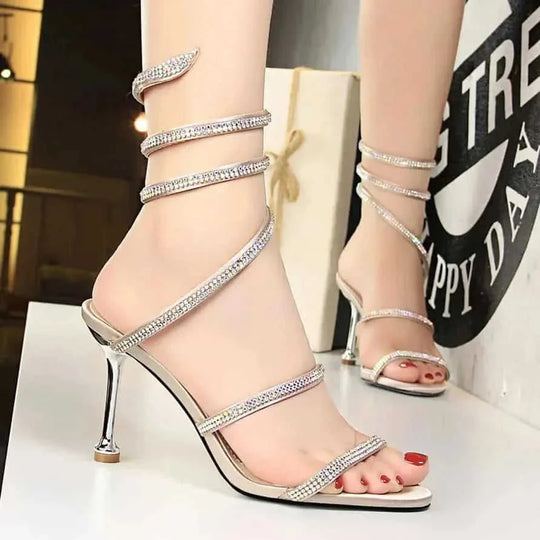 snake-shaped stiletto heels | rhinestone embellished heels | evening party shoes | energy saving
