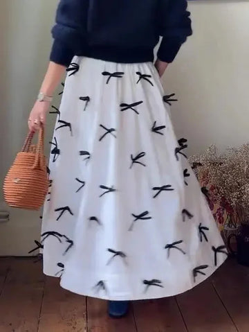 high-waist bow skirt | a-line midi skirt | elastic waistband skirt | ultrasonic cleaning
