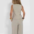 lightweight linen blend fabric | high-waisted wide-leg trousers | breathable sleeveless vest top | ultrasonic cleaning