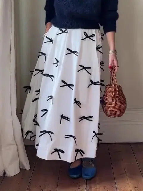high-waist bow skirt | a-line midi skirt | elastic waistband skirt | energy saving