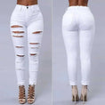 high-waisted ripped skinny jeans | distressed denim trousers for women | slim fit pencil pants | ultrasonic cleaning