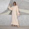 feather detail maxi dress | long sleeve round neck dress | lace-up back dress | ultrasonic cleaning