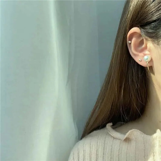 pierced female pearl tassel asymmetric stud earrings